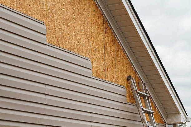Professional Vinyl Siding technician working in Palm Bay, FL